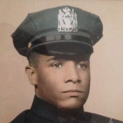 He is on wearing his cop uniform in the picture.